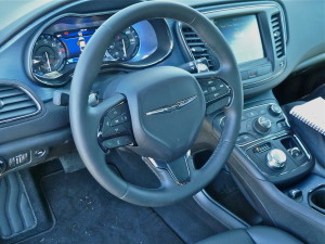 Ergonomical and appealing interior includes rotating gearshift knob.
