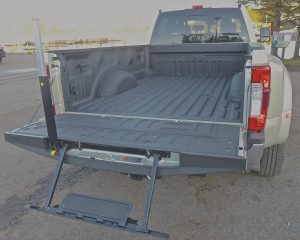 Drop-down step, complete with grab handle, makes loading and unloading easier. 